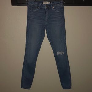 Distressed light wash jeans